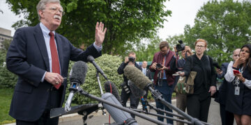 Archive photo: Then–White House National Security Adviser John Bolton talks to reporters outside the West Wing of the White House, May 1, 2019. (Official White House Photo by Tia Dufour)