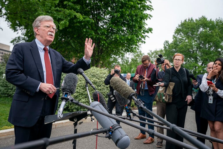 Archive photo: Then–White House National Security Adviser John Bolton talks to reporters outside the West Wing of the White House, May 1, 2019. (Official White House Photo by Tia Dufour)