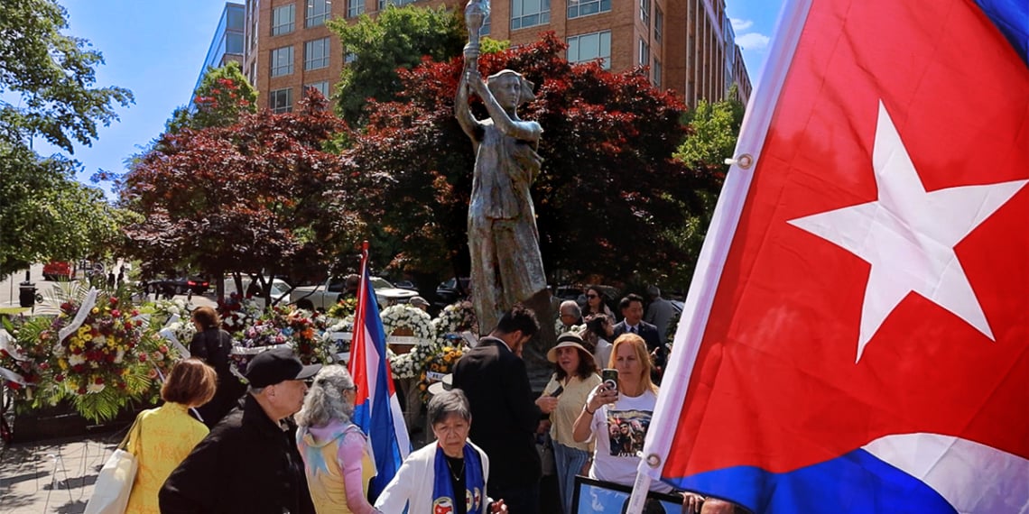 Participants gather at the Victims of Communism Memorial in Washington during the Roll Call of Nations ceremony, which honors victims of communist regimes worldwide.