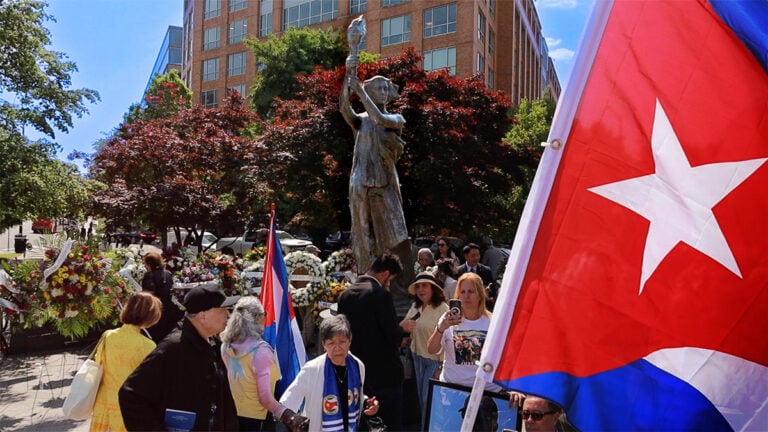 Participants gather at the Victims of Communism Memorial in Washington during the Roll Call of Nations ceremony, which honors victims of communist regimes worldwide.
