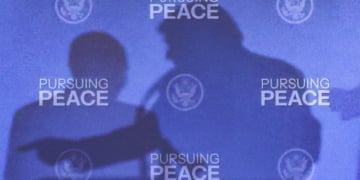 The shadows of U.S. President Donald Trump and Russian President Vladimir Putin are cast during a press conference following their meeting to negotiate an end to the war in Ukraine, at Joint Base Elmendorf-Richardson, in Anchorage, Alaska, U.S., August 15, 2025. REUTERS/Kevin Lamarque TPX IMAGES OF THE DAY