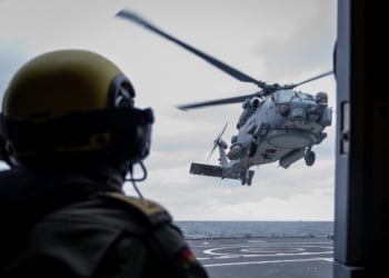 A German flight crew guides an NH-90 helicopter in to land aboard the German Navy Frigate FGS Sachsen-Anhalt during exercise BALTOPS.
NATO Allies conducted BALTOPS 2026 in the Baltic Sea, training maritime forces to deter threats, protect sea lines of communication and safeguard critical undersea infrastructure.